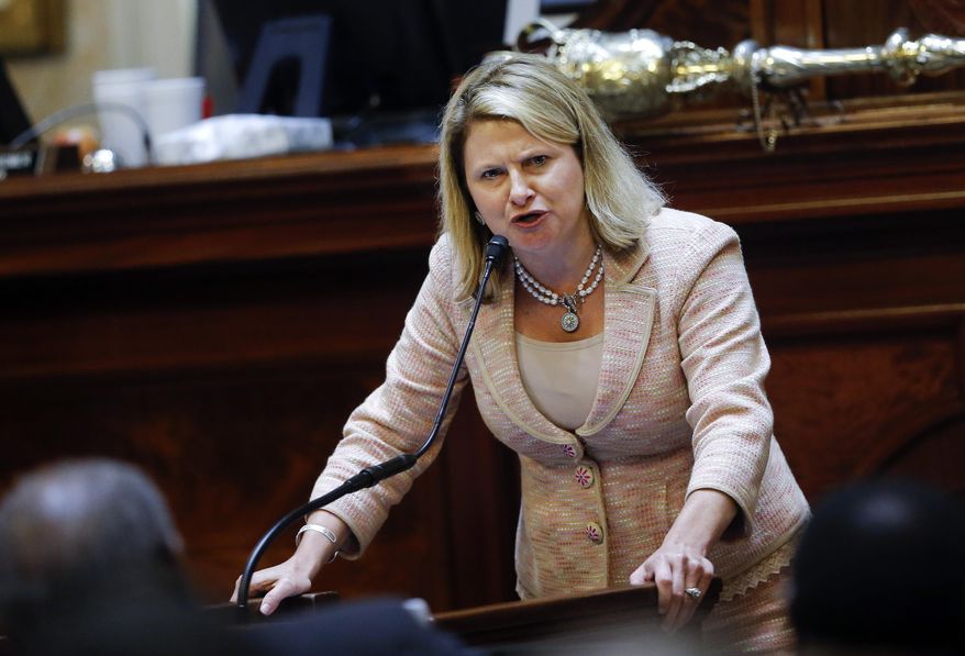 Rep. Jenny Horne, R-Summerville, speaks in favor of taking down the Confederate flag during debate over a Senate bill calling for the flag to be removed from the Capitol grounds, Wednesday, July 8, 2015, in Columbia, S.C. The House is under pressure to act after the state Senate passed its own measure, which is supported by Gov. Nikki Haley. (AP Photo/John Bazemore)