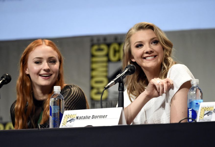 Sophie Turner, left, and Natalie Dormer attend the "Game of Thrones" panel on day 2 of Comic-Con International on Friday, July 10, 2015, in San Diego, Calif. (Photo by Chris Pizzello/Invision/AP)