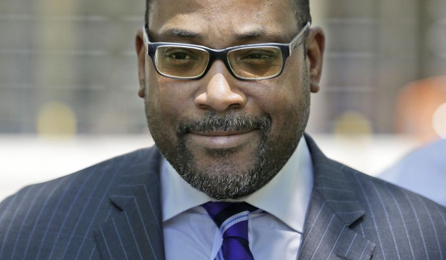 FILE- In this June 22, 2015, file photo, New York state Sen. John Sampson leaves federal court in the Brooklyn borough of New York after jury selection in his obstruction of justice trial. Sampson is accused of asking a friend, who was a paralegal in the U.S. Attorney’s Office in Brooklyn, sneak him the names of cooperating witnesses after he came under scrutiny in a corruption probe. (AP Photo/Seth Wenig, File)