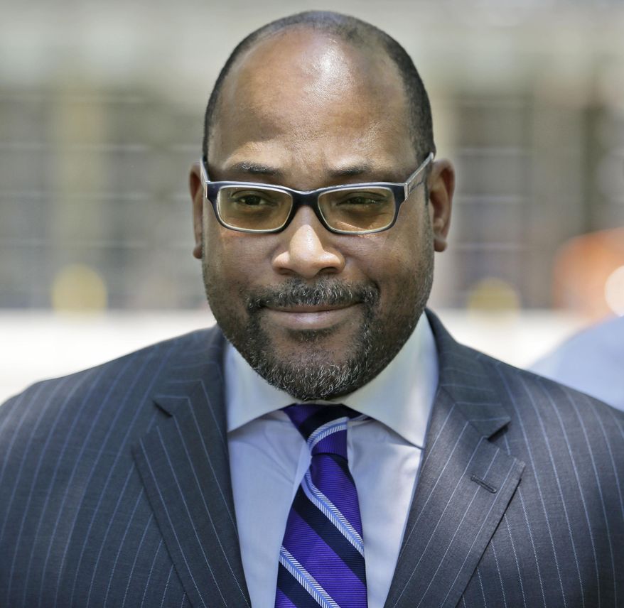 FILE- In this June 22, 2015, file photo, New York state Sen. John Sampson leaves federal court in the Brooklyn borough of New York after jury selection in his obstruction of justice trial. Sampson is accused of asking a friend, who was a paralegal in the U.S. Attorney’s Office in Brooklyn, sneak him the names of cooperating witnesses after he came under scrutiny in a corruption probe. (AP Photo/Seth Wenig, File)