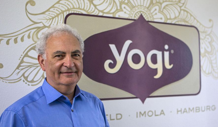 ADVANCE FOR USE SUNDAY, JULY 12, 2015, AND THEREAFTER- In this July 3, 2015, photo, Conrad Myers, CEO of Yogi, visits one of their manufacturing plants and sales office in Springfield, Ore. Fueled by growing demand for its lineup of hot teas, the maker of Yogi Tea plans to roughly double its space by building a facility in west Eugene. (AP Photo via Mary Jane Schulte/The Register-Guard)