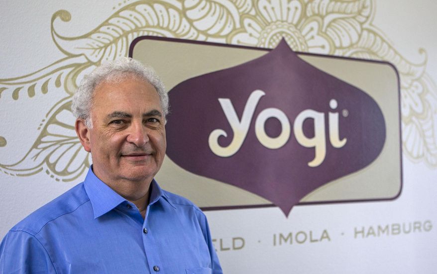 ADVANCE FOR USE SUNDAY, JULY 12, 2015, AND THEREAFTER- In this July 3, 2015, photo, Conrad Myers, CEO of Yogi, visits one of their manufacturing plants and sales office in Springfield, Ore. Fueled by growing demand for its lineup of hot teas, the maker of Yogi Tea plans to roughly double its space by building a facility in west Eugene. (AP Photo via Mary Jane Schulte/The Register-Guard)