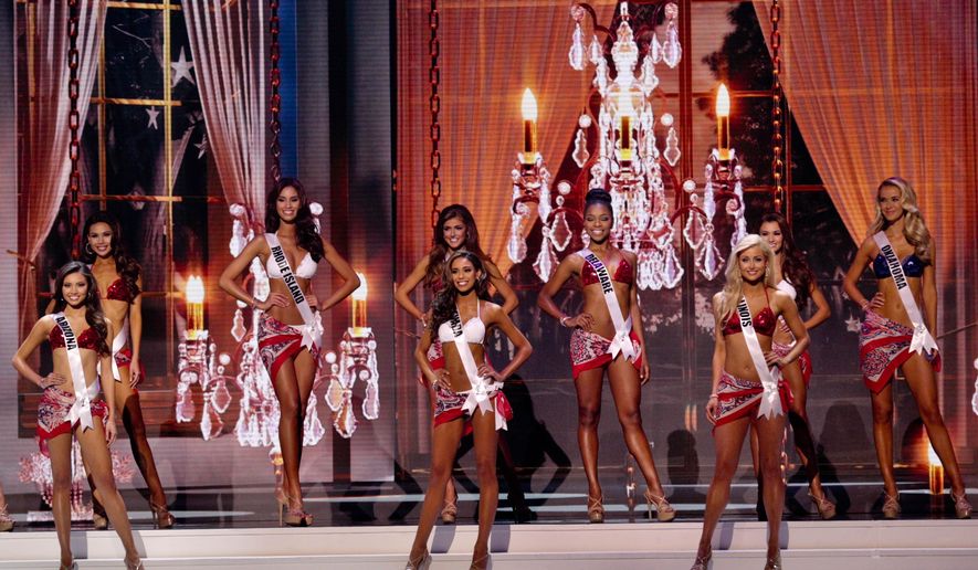 Contestants for Miss USA during the swimsuit competition of the 2015 Miss USA pageant in Baton Rouge, La., Sunday, July 12, 2015. (AP Photo/Derick E. Hingle)