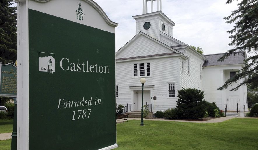 In this July 9, 2015 photo, a sign notes the school's founding in 1787 on the campus of Castleton State College in Castleton, Vt. The college seeks to change its name to Castleton University to reflect its growth in graduate programs and to attract more out-of-state and foreign students. (AP Photo/Lisa Rathke)