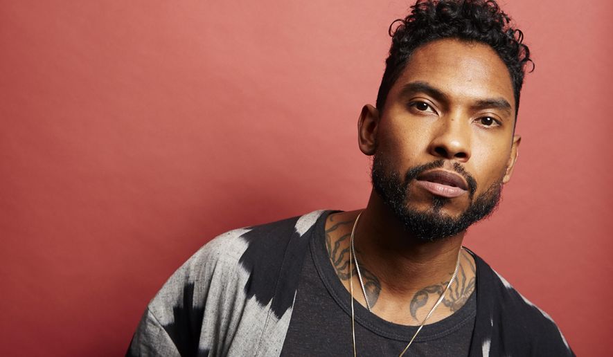 In this July 1, 2015 photo, singer Miguel poses for a portrait to his new album "Wildheart", in New York. (Photo by Dan Hallman/Invision/AP)