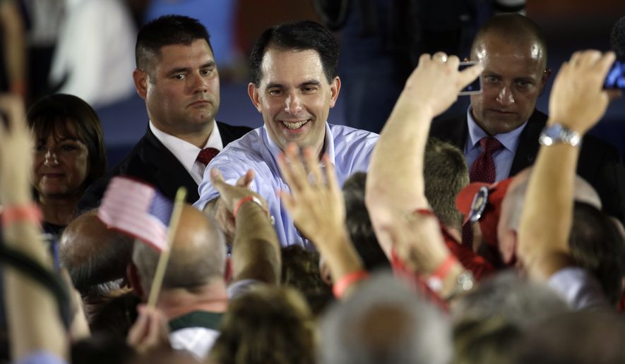 Wisconsin Gov. Scott Walker made clear that he plans to distinguish himself in a crowded field of 15 to 17 candidates by embracing conservative policy prescriptions, regardless of their perceived popularity in the media and polls. (Associated Press)