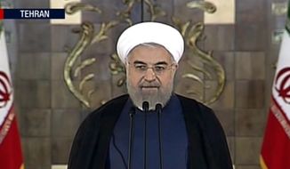 This image made from video broadcast on Press TV, Iran&#x27;s English language state-run channel shows President Hassan Rouhani making a statement following announcement of the Iran nuclear deal, Tuesday, July 14, 2015 in Teran. Rouhani says &#x27;a new chapter&#x27; has begun in relations with the world. (Press TV via AP video)