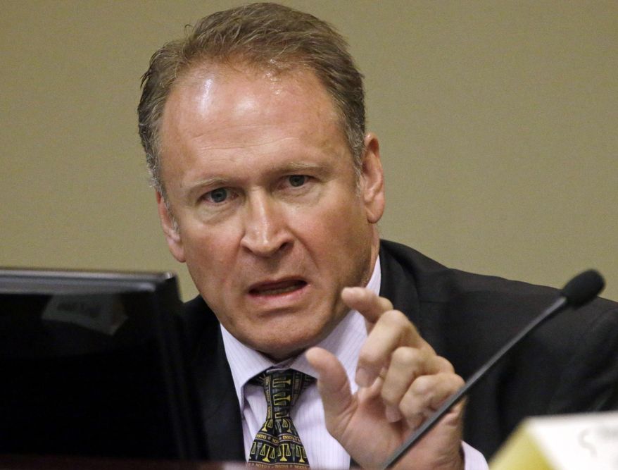 Eagle Mountain Republican Sen. Mark Madsen speaks during a hearing before the Health and Human Services Interim Committee Wednesday, July 15, 2015, in Salt Lake City. Madsen renewed his push for conservative Utah to pass a medical marijuana law, a move he argues is a win for limited government, conservative values and compassion. (AP Photo/Rick Bowmer)