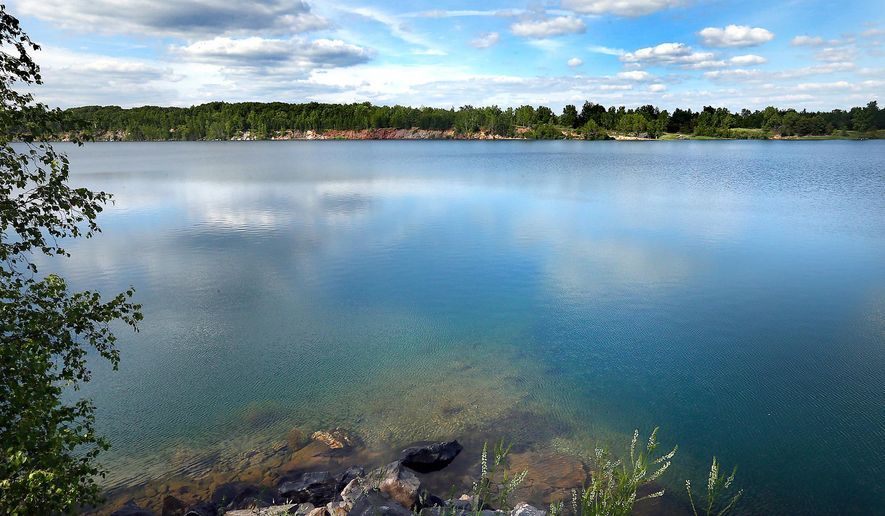 In this July 8, 2015 photo, Jackson County’s Lake Wazee is the Midwest’s premier site for scuba divers in Black River Falls, Wis. As the Midwest's premier site for scuba divers, Lake Wazee draws about 1,500 divers each year, according to Jackson County's forestry and parks department. But the high interest also means that the lake gets more than its share of fatal accidents. (Erik Daily/La Crosse Tribune via AP) MANDATORY CREDIT