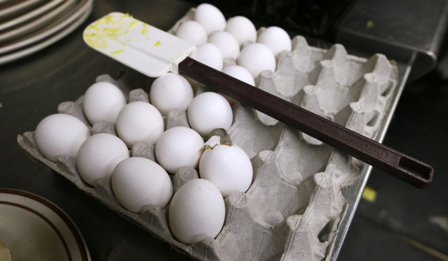 In a Friday, June 19, 2015 file photo, eggs sit waiting to be cooked at the Waveland Cafe, in Des Moines, Iowa. (AP Photo/Charlie Neibergall, File)