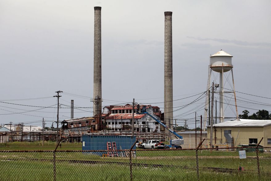 ADVANCE FOR THE WEEKEND OF JULY 18-19 AND THEREAFTER - The Hercules plant is shown in a Tuesday, June 30, 2015 photo in Hattiesburg, Miss. For almost a century, the Hercules plant has stood as one of Hattiesburg's most prominent landmarks. Built shortly after World War I, the facility started out with a small workforce before expanding to one of the state's largest employers over the next 50 years. In its heyday, the company produced more than 250 chemical products. (Eli Baylis/The Hattiesburg American via AP)