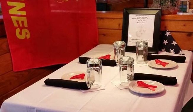 A former Marine who manages a Chattanooga, Tennessee, restaurant honored the four troops killed by a gunman in a July 16 attack on two nearby military facilities by setting a table as a memorial. (WTVC)