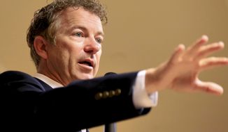 Sen. Rand Paul, Kentucky Republican and presidential hopeful, speaks during a meet and greet event in Council Bluffs, Iowa, on July 1, 2015. (Associated Press) **FILE**