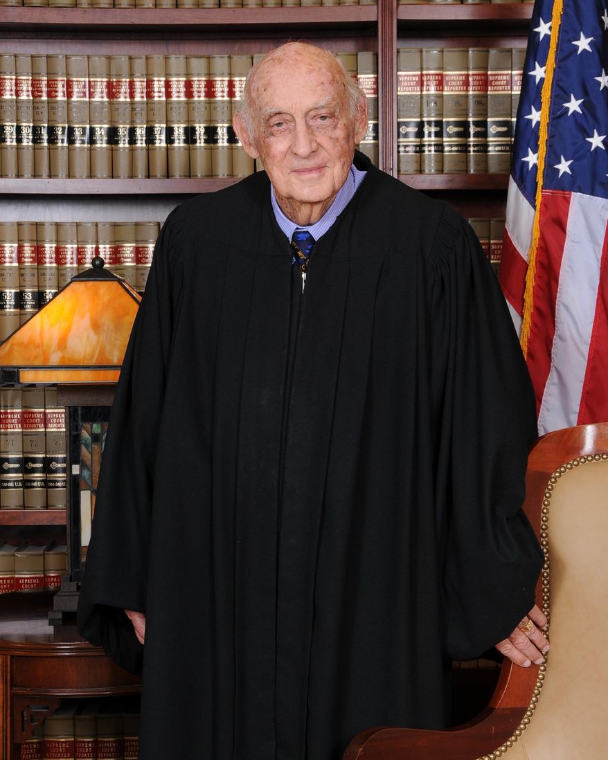 This photo provided by the United States District Court, District of Kansas shows U.S. District Judge Richard Rogers. Rogers, 93, plans to go on full retirement in August. He is one of two federal judges in Kansas leaving the federal courts in Kansas in the coming months. (United States District Court, District of Kansas, via AP)