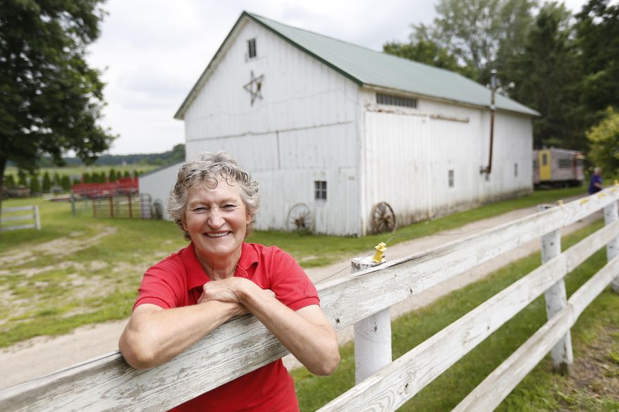 Marie Brown owner of Heritage Farm is photographed on July 8, 2015 in Hudson, Iowa. A slice of northeast Iowa's cultural history will disappear under an auctioneer's gavel when Heritage Farm goes on the block later this month. The 80-acre property served as a destination for families, church groups and busloads of schoolchildren since its opening in 1980. (Matthew Putney/The Courier via AP) MANDATORY CREDIT