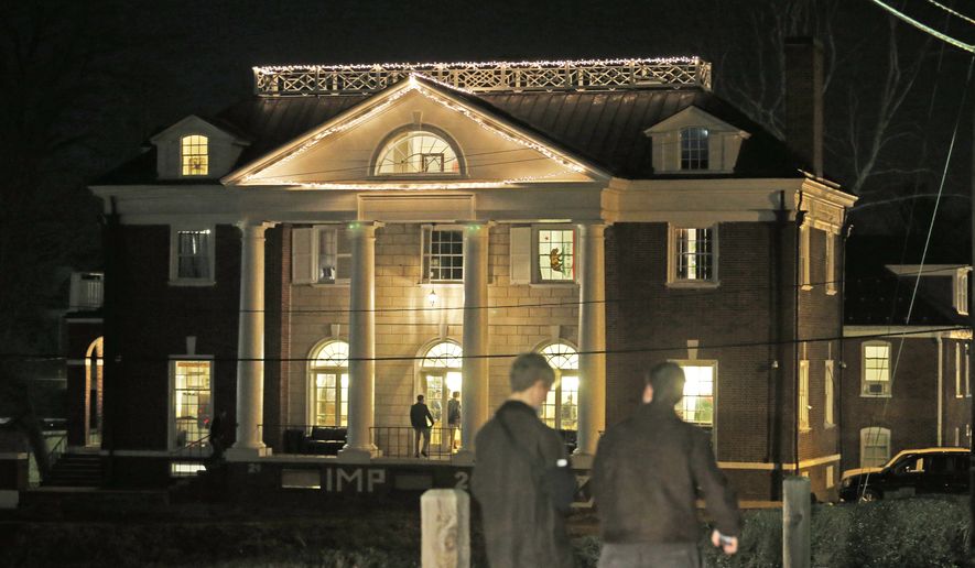 Students participating in rush pass by the Phi Kappa Psi house at the University of Virginia in Charlottesville, Va., on Jan. 15. (Associated Press)
