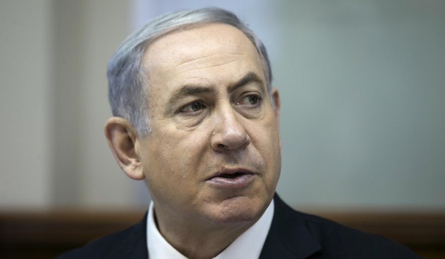 Israeli Prime Minister Benjamin Netanyahu speaks during the weekly cabinet meeting in Jerusalem on July 19, 2015. (Associated Press) **FILE**