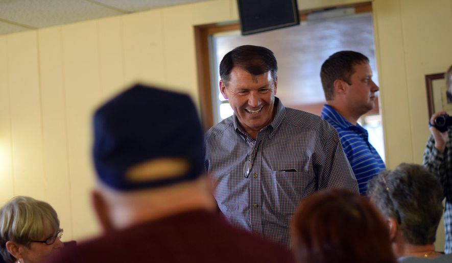 In this Nov. 2, 2014, file photo, then-U.S. Senate candidate Mike Rounds greets patrons of the Belle Inn Restaurant in Belle Fourche, S.D. Rounds won the election and has now started fundraising through the Peter Norbeck Leadership PAC. Those committees are often used to raise a politician’s profile and help get like-minded candidates elected. (AP Photo/Kevin Burbach, file)