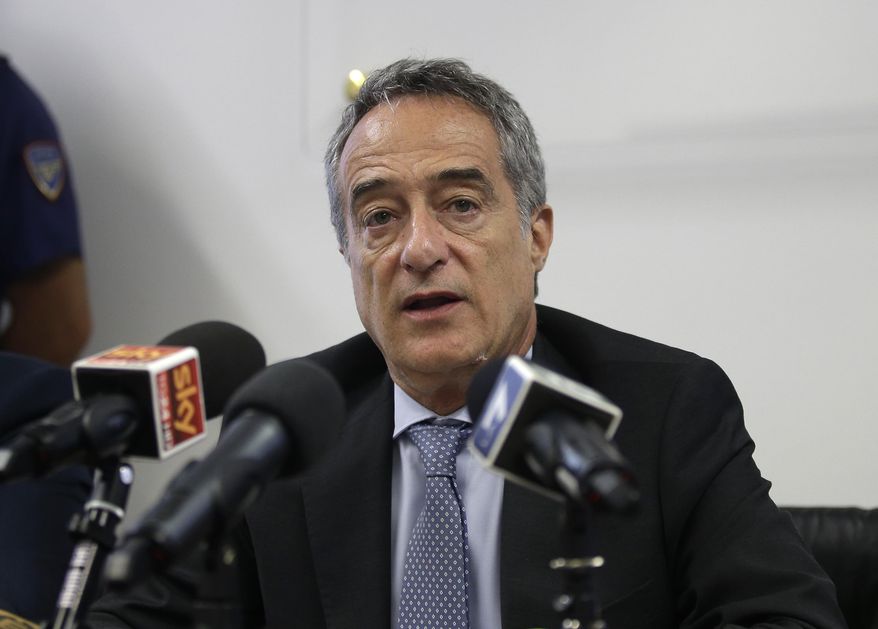 Prosecutor Maurizio Romanelli talks during a news conference to illustrate an anti-terrorism operation, at the Police headquarters in Milan, Italy, Wednesday, July 22, 2015. Italian prosecutors say two men behind a Twitter account that carried threats in the name of the Islamic State group were targeting an Italian military base near Brescia that has a U.S. military presence. (AP Photo/Antonio Calanni) ** FILE **