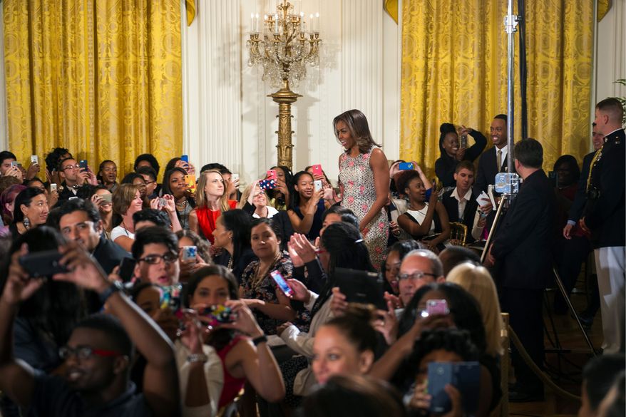 First lady Michelle Obama welcomed over 130 college-bound high school students to the daylong White House event as part of her Reach Higher initiative. (Associated Press)