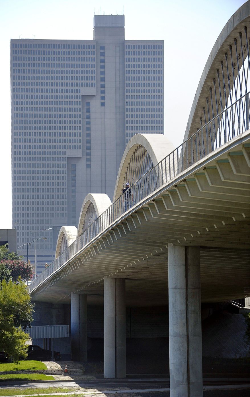 West Seventh Street bridge in Fort Worth, Texas, Monday, July 13, 2015. Venus, Texas, experienced a 4.0 earthquake in May, 2015, and the next morning the Texas Department of Transportation sent inspectors out to look at bridges and make sure there was no damage. All bridges built in the Fort Worth area since the 1990s have been designed with standards for areas with a low risk of earthquakes. (Max Faulkner/Fort Worth Star-Telegram via AP) MANDATORY CREDIT MAGS OUT (FORT WORTH WEEKLY, 360 WEST); INTERNET OUT