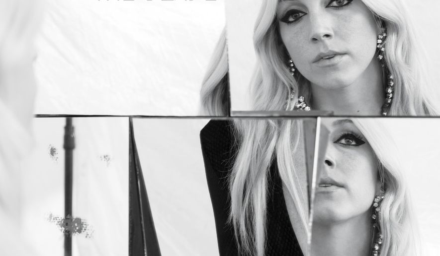 This CD cover image released by Warner Music Nashville shows "The Blade," a new release by Ashley Monroe, out Friday, July 24. (Warner Music Nashville via AP)