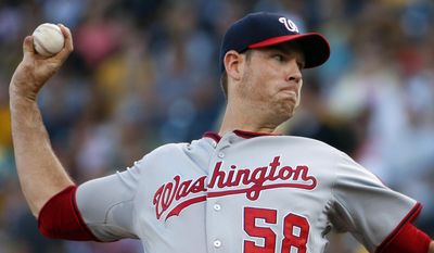 Washington Nationals starting pitcher Doug Fister delivers during the first inning of a baseball game against the Pittsburgh Pirates in Pittsburgh, Thursday, July 23, 2015. (AP Photo/Gene J. Puskar)