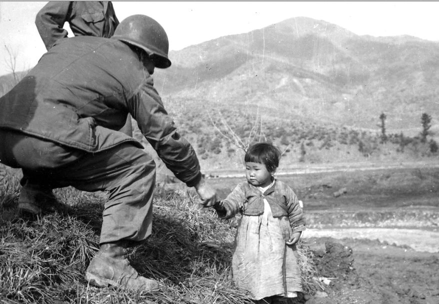 A historical image and a poignant moment from the Korean War  (Defense Department)