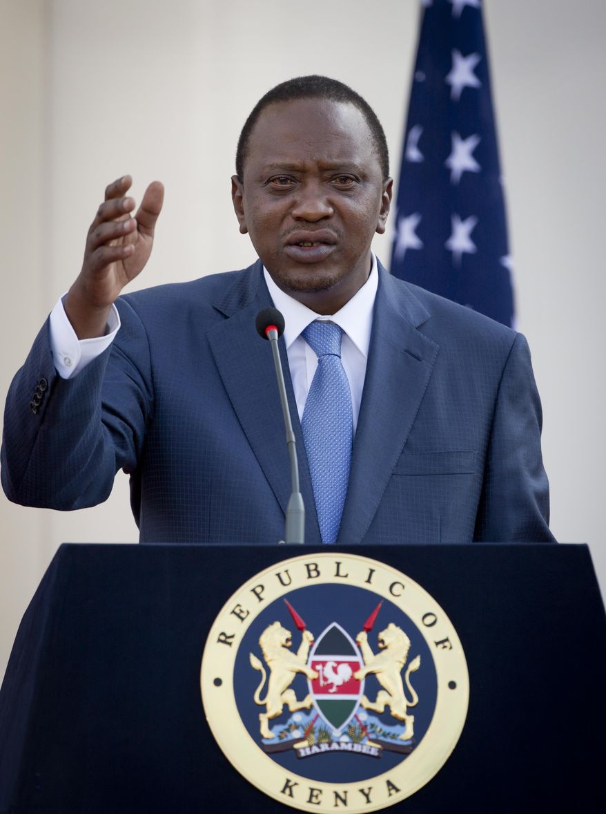 Kenya's President Uhuru Kenyatta answers questions from the media after meeting with President Barack Obama at State House in Nairobi, Kenya Saturday, July 25, 2015. (AP Photo/Ben Curtis)