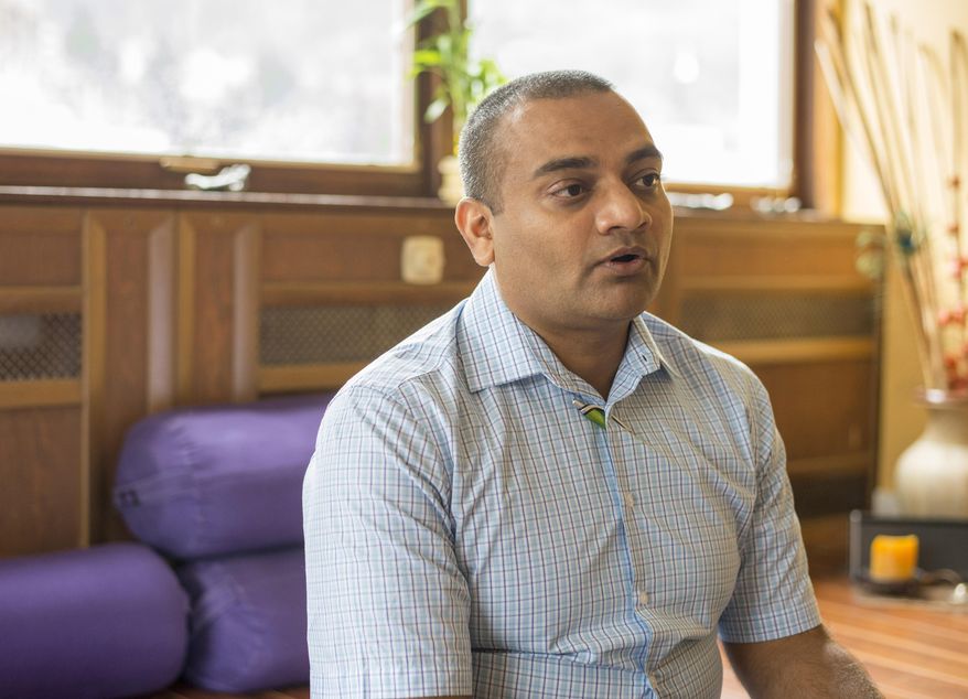 ADVANCE FOR SUNDAY JULY 26, 2015, AND THEREAFTER- In this Thursday, July 16, 2015 photo, yoga philosopher Ram Vakkalanka answers questions in Ketchikan, Alaska. Vakkalanka said he hopes he is presenting Ketchikan residents with “a comprehensive look at yogic discipline, yoga as a lifestyle, yoga as a mantra of philosophy to live by” this weekend with a series of workshops and performances organized through Ketchikan’s Advaita Yoga Center. (Taylor Balkom/Ketchikan Daily News via AP) MANDATORY CREDIT
