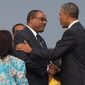 President Obama shakes hands with Ethiopian Prime Minister Hailemariam Desalegn after arriving at Addis Ababa Bole International Airport Sunday. Mr. Obama is the first sitting U.S. president to visit Ethiopia. His trip also included a stop in Kenya, the homeland of his late father. (Associated Press)