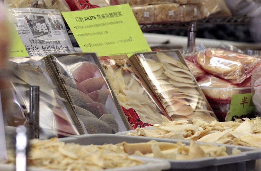FILE - In this Thursday, May 5, 2011 photo, packages of dried shark fin products are shown in a store in Chinatown in San Francisco. A federal appeals court Monday dismissed a legal challenge to a California law banning the sale, distribution and possession of shark fins. The 2-1 ruling upheld a lower court decision tossing the lawsuit brought by the Chinatown Neighborhood Association and Asian Americans for Political Advancement, a political action committee. (AP Photo/Jeff Chiu, File)