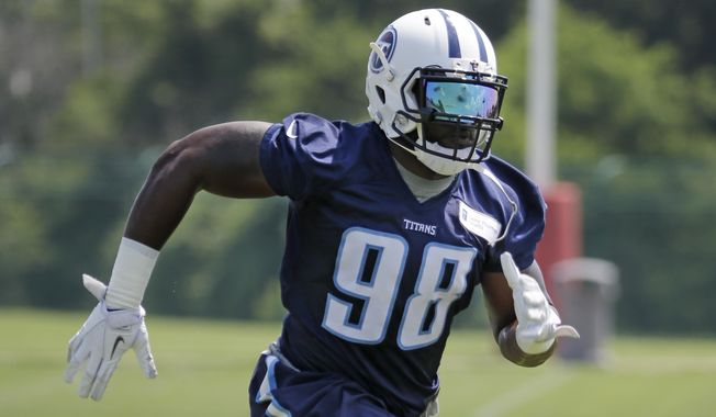 FILE - In this June 10, 2015, filephoto, Tennessee Titans defensive tackle Brian Orakpo practices during an organized team activity at the team&#x27;s NFL football training facility in Nashville, Tenn. The Titans signed a handful of free agents this offseason, including outside linebacker Orakpo. (AP Photo/Mark Humphrey, File)