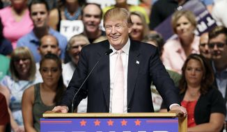 Republican presidential candidate Donald Trump speaks at a rally and picnic in Oskaloosa, Iowa, in this July 25, 2015, file photo. (AP Photo/Charlie Neibergall, File)