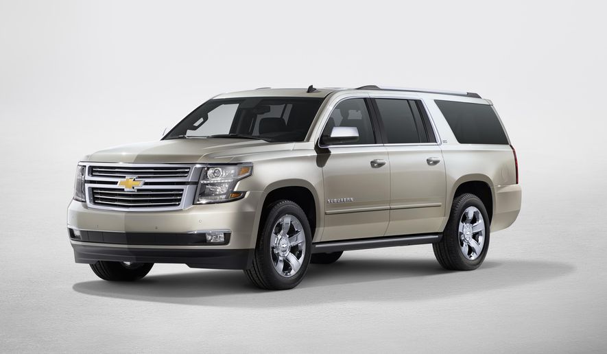 This product image provided by General Motors shows a 2015 Chevrolet Suburban. The expansive, 19-foot-long Suburban is refreshed for 2015 with more engine power, best-in-class fuel economy, more features than ever, a surprisingly quiet interior and more comfortable seats _ large, of course. (General Motors via AP)
