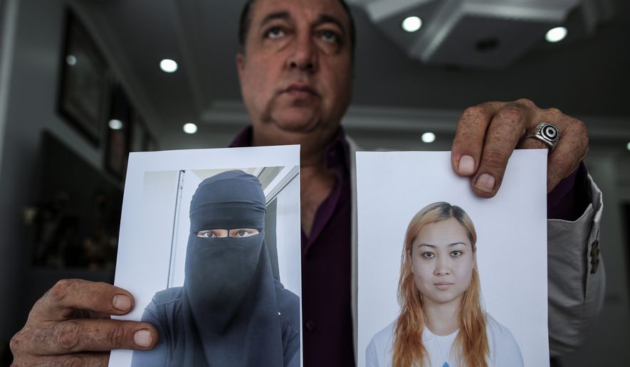Sahin Aktan says his ex-wife, Asiya Ummi Abdullah, became a Muslim convert and took their child to the territory controlled by Islamic State. (Associated Press)