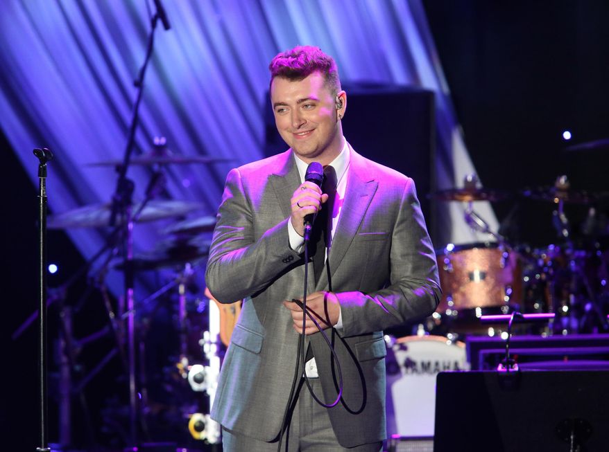 FILE - In this Feb. 7, 2015 file photo, Sam Smith performs at the 2015 Clive Davis Pre-Grammy Gala show at the Beverly Hilton Hotel in Beverly Hills, Calif. Kanye West, Smith, Janet Jackson and the Who are some of the A-Listers set for the iHeartRadio Music Festival this fall. IHeartMedia announced Thursday, July 30, 2015, that Lil Wayne, Coldplay, the Weeknd and Blake Shelton will also perform during the two-day event in Las Vegas on Sept. 18-19. (Photo by Paul Hebert/Invision/AP, File)