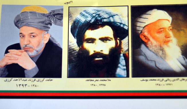 The death of Mullah Mohammad Omar (center) was confirmed by the Taliban, which postponed a second round of talks with Kabul. (Associated Press)