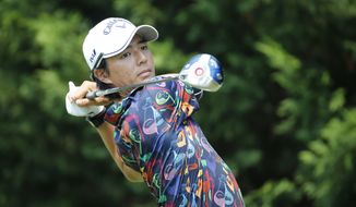 Ryo Ishikawa, of Japan, watches his tee shot on the third hole during the first round of the Quicken Loans National golf tournament at the Robert Trent Jones Golf Club in Gainesville, Va., Thursday, July 30, 2015. (AP Photo/Steve Helber)