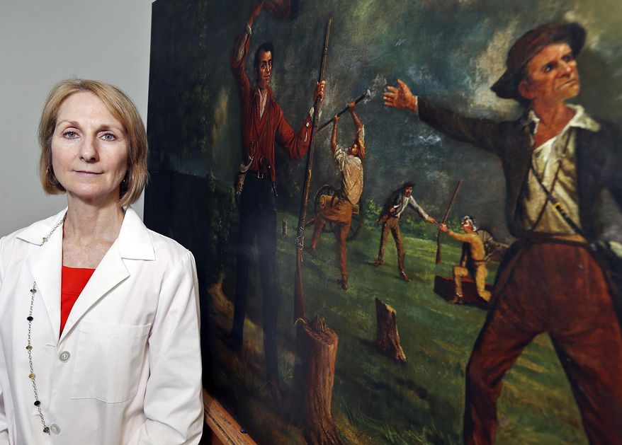 ADVANCE FOR THE WEEKEND OF AUG. 1-2 AND THEREAFTER - Portrait of Art Conservator Anne W. Zanikos who is working on Harry Arthur McArdle's 1901 painting "Ben Milam Calling For Volunteers", right, poses for a photo with the painting Thursday, July 23, 2015 in San Antonio. Zanikos has nearly finished saving the 114-year-old painting from the Alamo that depicts a key moment in the Texas independence struggle. After four months of conservation work at an Olmos Park studio, "Ben Milam Calling for Volunteers," painted in 1901 by Texas artist Harry Arthur McArdle, could return next month to the shrine. (Edward A. Ornelas/The San Antonio Express-News via AP) RUMBO DE SAN ANTONIO OUT; NO SALES; MANDATORY CREDIT