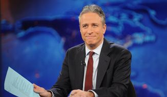 This Nov. 30, 2011, file photo shows television host Jon Stewart during a taping of &quot;The Daily Show with Jon Stewart&quot; in New York. Stewart signed off for good on Aug. 6. (AP Photo/Brad Barket, File)