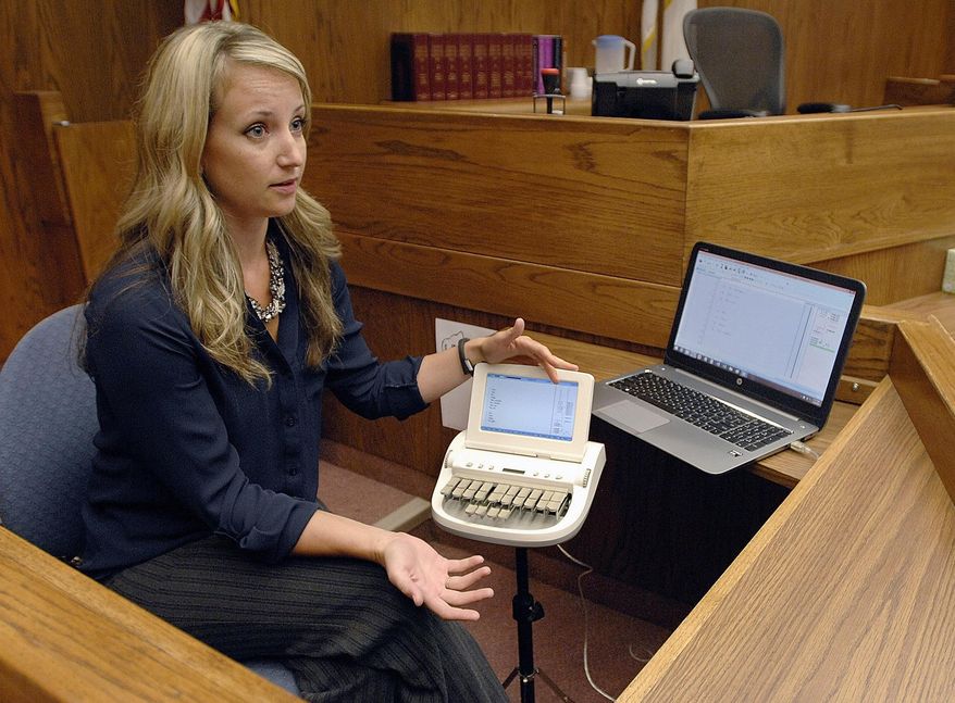 n this July 28, 2015 photo, McLean County court reporter Georgia Rollins sits with her reporting equipment at the Law and Justice Center in Bloomington, Ill. Illinois courts are facing a shortage of court reporters, with the average age of people in the profession rising and fewer young people taking it on as a career. A majority of Illinois courts have introduced electronic recording devices as a means of addressing the court reporter shortage. McLean County recently approved a $90,000 bid to place the audio systems in six courtrooms. (Lori Ann Cook-Neisler/The Pantagraph via AP)
