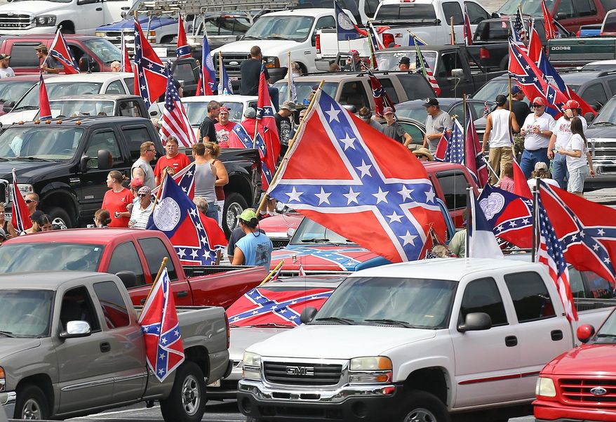 Pro-Confederate flag supporters gather for a rally at Stone Mountain Park on Saturday, Aug. 1, 2015, in Stone Mountain, Ga. (Curtis Compton/Atlanta Journal-Constitution via AP) MARIETTA DAILY OUT; GWINNETT DAILY POST OUT; LOCAL TELEVISION OUT; WXIA-TV OUT; WGCL-TV OUT; MANDATORY CREDIT
