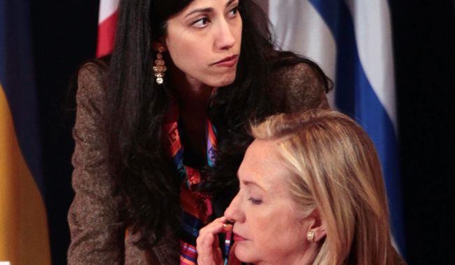 Huma Abedin, a longtime assistant to Hillary Rodham Clinton, has been under investigation for a $33,000 payout from the State Department. (Associated Press) ** FILE **