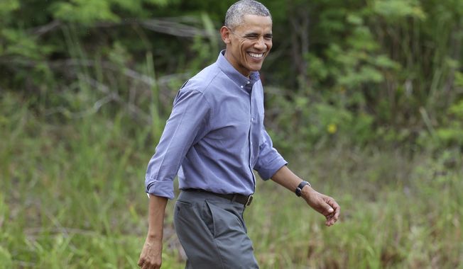 President Barack Obama arrives before making a statement after touring Everglades National Park on Earth Day, Wednesday, April 22, 2015, in Florida. Obama used the visit  to warn of the damage that climate change is already inflicting on the nation&#x27;s environmental treasures. (AP Photo/Lynne Sladky)
