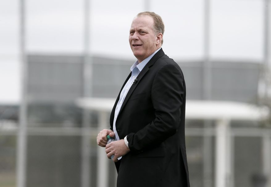 In this Feb. 25, 2015, file photo, baseball broadcast analyst and former Boston Red Sox pitcher Curt Schilling watches as the Red Sox workout at baseball spring training in Fort Myers Fla. Boston Mayor Martin J. Walsh wants to ban chewing tobacco in sports venues across the city. The mayor is expected to discuss a proposed new ordinance Wednesday, Aug. 5. Public health officials, advocates, local youth and Schilling are expected to attend. (AP Photo/Tony Gutierrez, File)