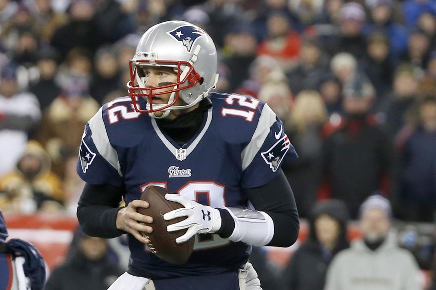 FILE - In this Jan. 10, 2015, file photo, New England Patriots quarterback Tom Brady (12) rolls out to pass against the Baltimore Ravens in the first half of an NFL divisional playoff football game in Foxborough, Mass. The Baltimore Ravens deny they tipped off the Indianapolis Colts about underinflated footballs before the AFC championship game. Court papers released Tuesday in New England quarterback Tom Brady's lawsuit against the NFL over his four-game suspension show that the Ravens contacted the Colts about deflated footballs used in Baltimore's playoff loss to the Patriots the previous week. But the Ravens said Wednesday, Aug. 5, 2015, that was not true. (AP Photo/Elise Amendola)