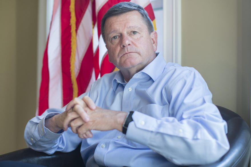 Ray Warwick, fiscal officer of suburban Hamilton Township and chairman of the Warren County republican Party, sits for a portrait at his home, Wednesday, Aug. 5, 2015, in Maineville, Ohio. For Republican activists in a party stronghold of swing-state Ohio, Thursday night's first major presidential campaign debate in Cleveland will be must-see TV as the GOP starts deciding which candidate to support, volunteer for and write checks to. (AP Photo/John Minchillo)