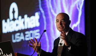Then-Deputy Secretary of Homeland Security Alejandro Mayorkas speaks at the Black Hat conference Thursday, Aug. 6, 2015, in Las Vegas. The annual computer security conference draws thousands of hackers and security professionals to Las Vegas. (AP Photo/John Locher)