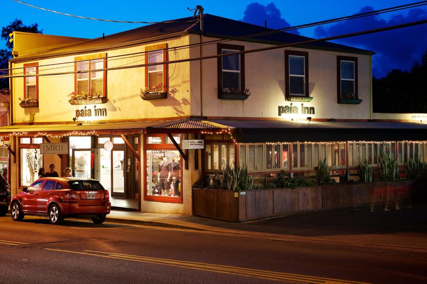 This 2012 photo provided by Paia Inn shows a popular boutique hotel in Paia, Hawaii. Maui County has slapped a half-million dollar fine on the owner of a the hotel as part of a settlement involving 30 alleged permit violations. Michael Baskin, the owner of the 14-room Paia Inn, said Wednesday, Aug. 5, 2015, that he's not acknowledging wrongdoing but wants to resolve the issue and have as good a relationship as possible with the county and community. (Travis Rowan/Paia Inn via AP)